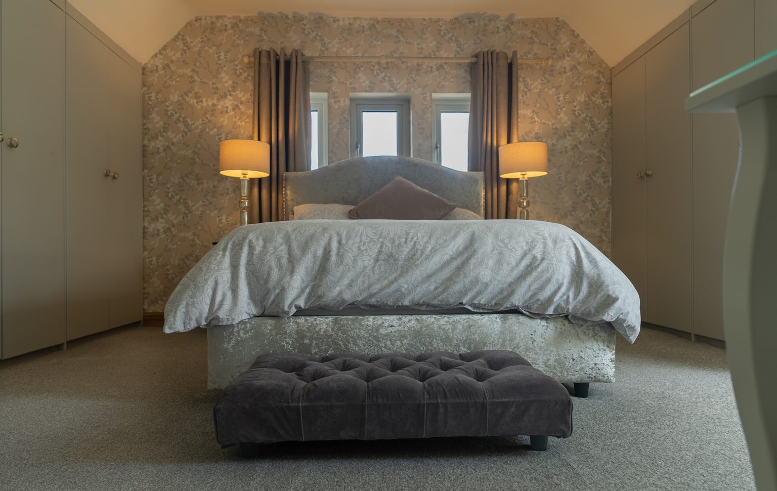 Restful main bedroom at The Old Print House