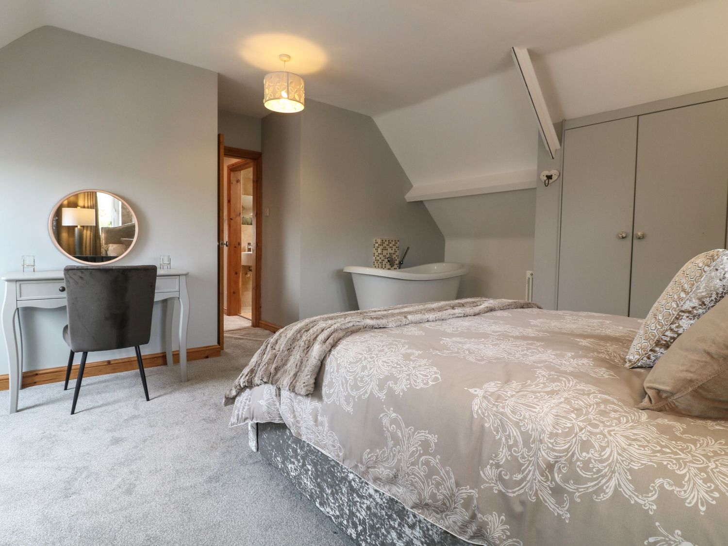 Calm main bedroom with a king-size bed